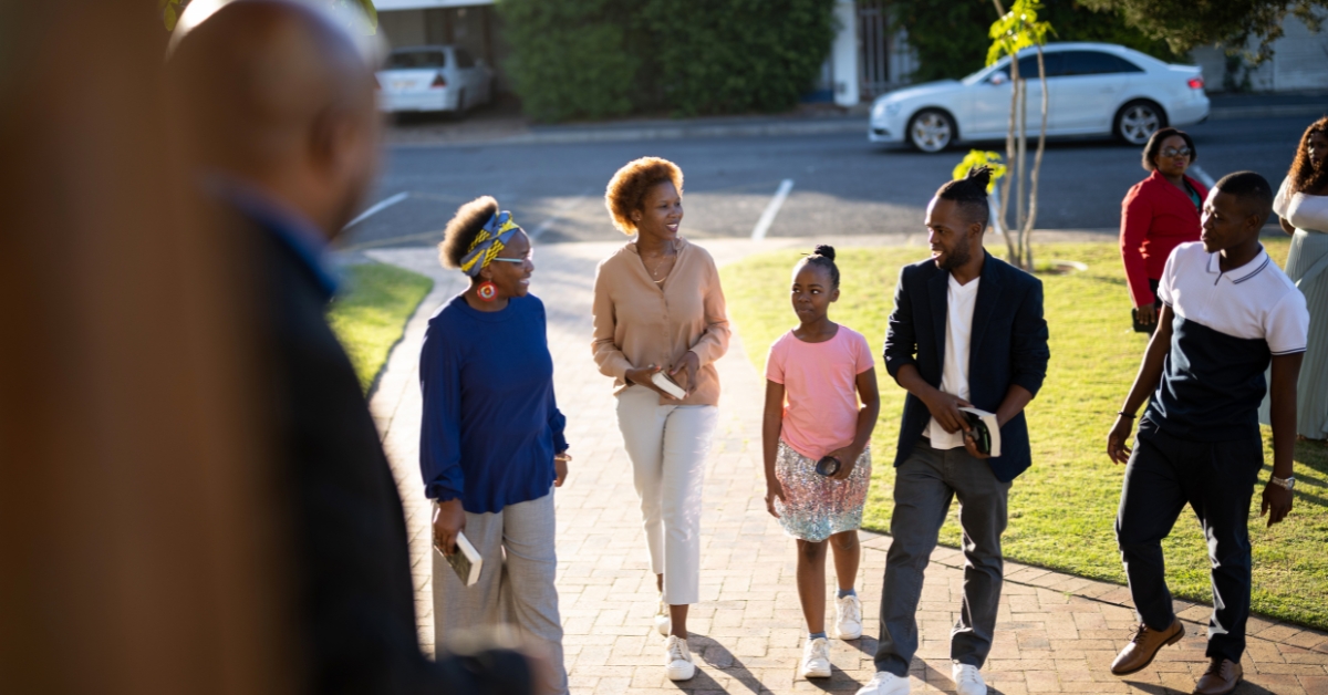 Families arriving at church for fall services — church community outreach guide